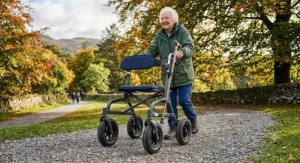All-terrain rollator with seat and large pneumatic tyres for walking on gravel paths