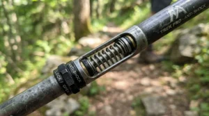 Close-up of anti-shock spring mechanism on hiking poles for bad knees during a Peak District walk
