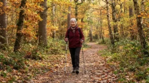 An older adult enjoying a steady woodland walk supported by lightweight trekking poles