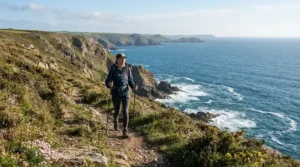 Lightweight trekking poles for arthritis providing stability on a paved Cornish coastal path