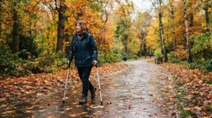 Walking through a local park on an autumn day with the best lightweight crutches
